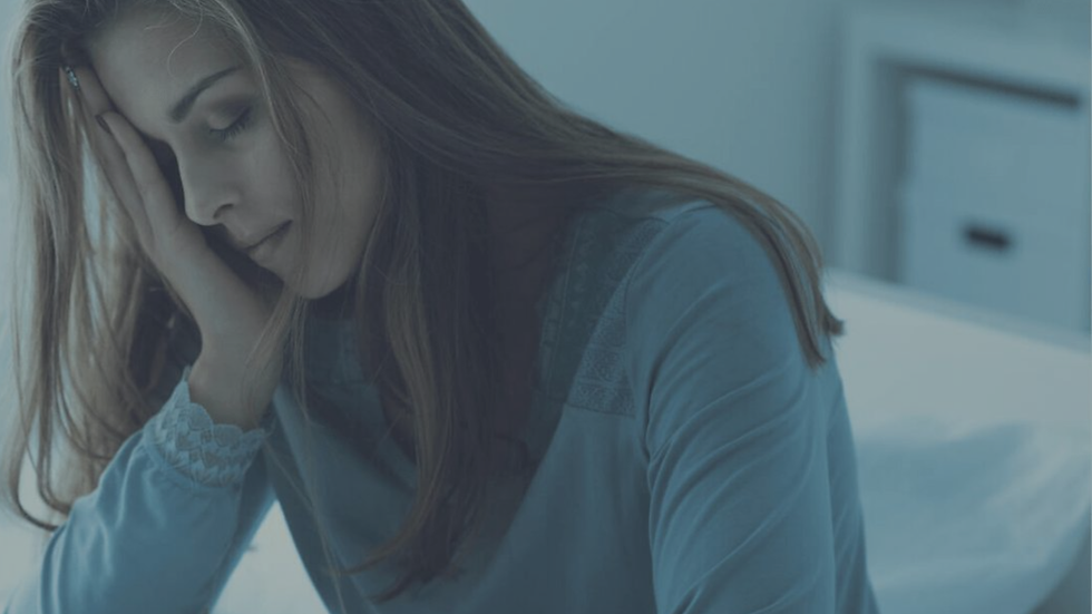 Person resting yet continuing to feel emotionally drained.
