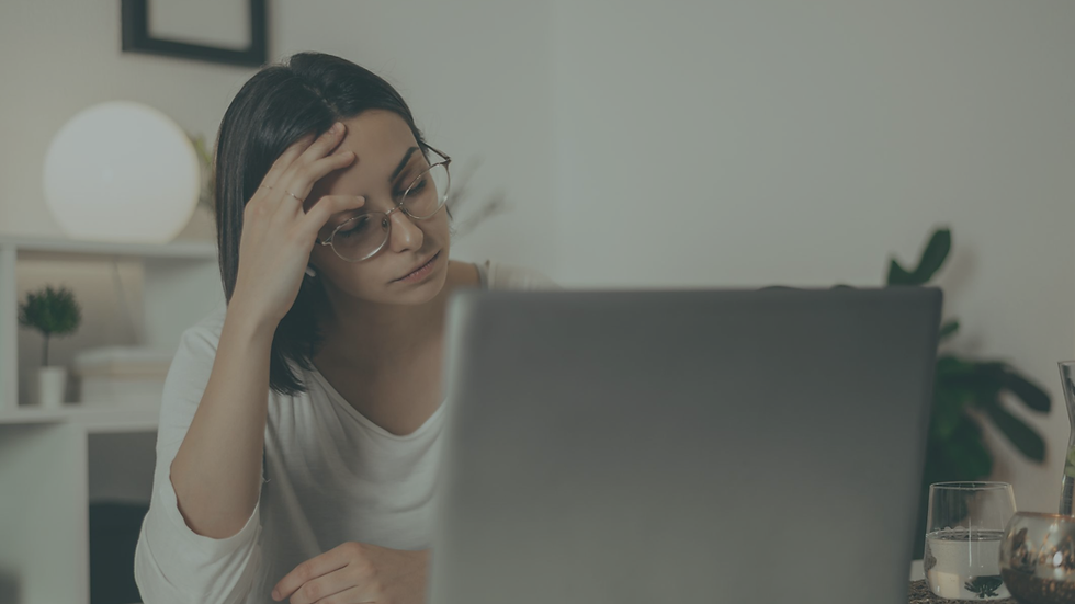 Woman appearing functional on the outside while quietly experiencing emotional exhaustion and depression alone at home.