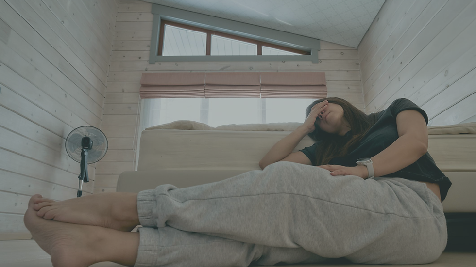 Young adult woman feeling stressed and tired at home
