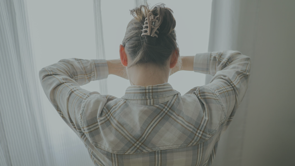 Person experiencing emotional overwhelm as chronic stress increases sensitivity to everyday situations.