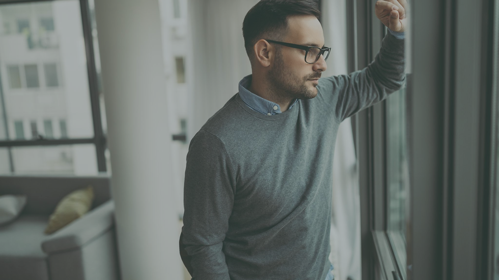 Person reflecting on identity and self-discovery during a major life transition.