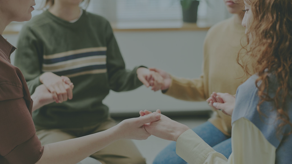 Group of people connecting and talking together, showing social support and emotional well-being through community