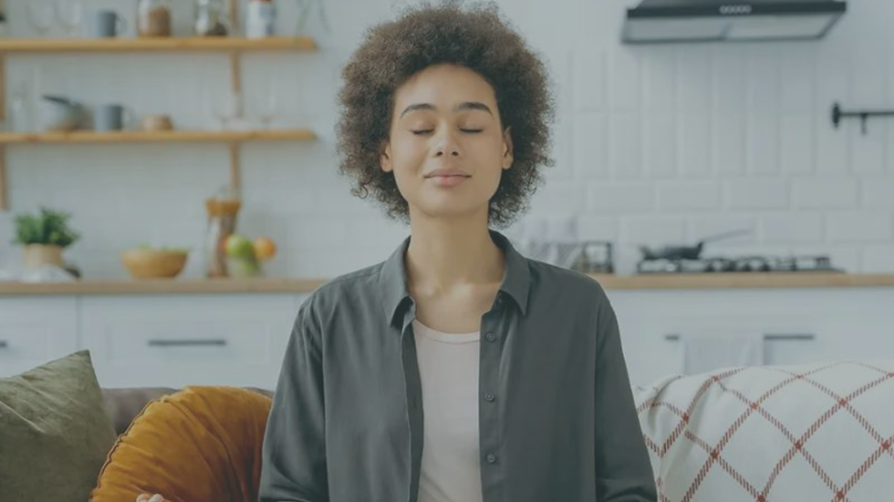 Person practicing self-reflection and emotional regulation, illustrating the process of building internal safety, self-trust, and healing from anxiety.