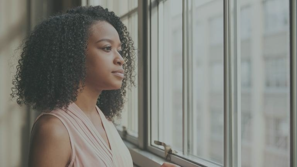 Person showing mixed emotions of awareness and frustration after therapy