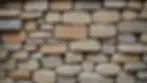 Close-up view of a hand-built stone wall demonstrating local craftsmanship