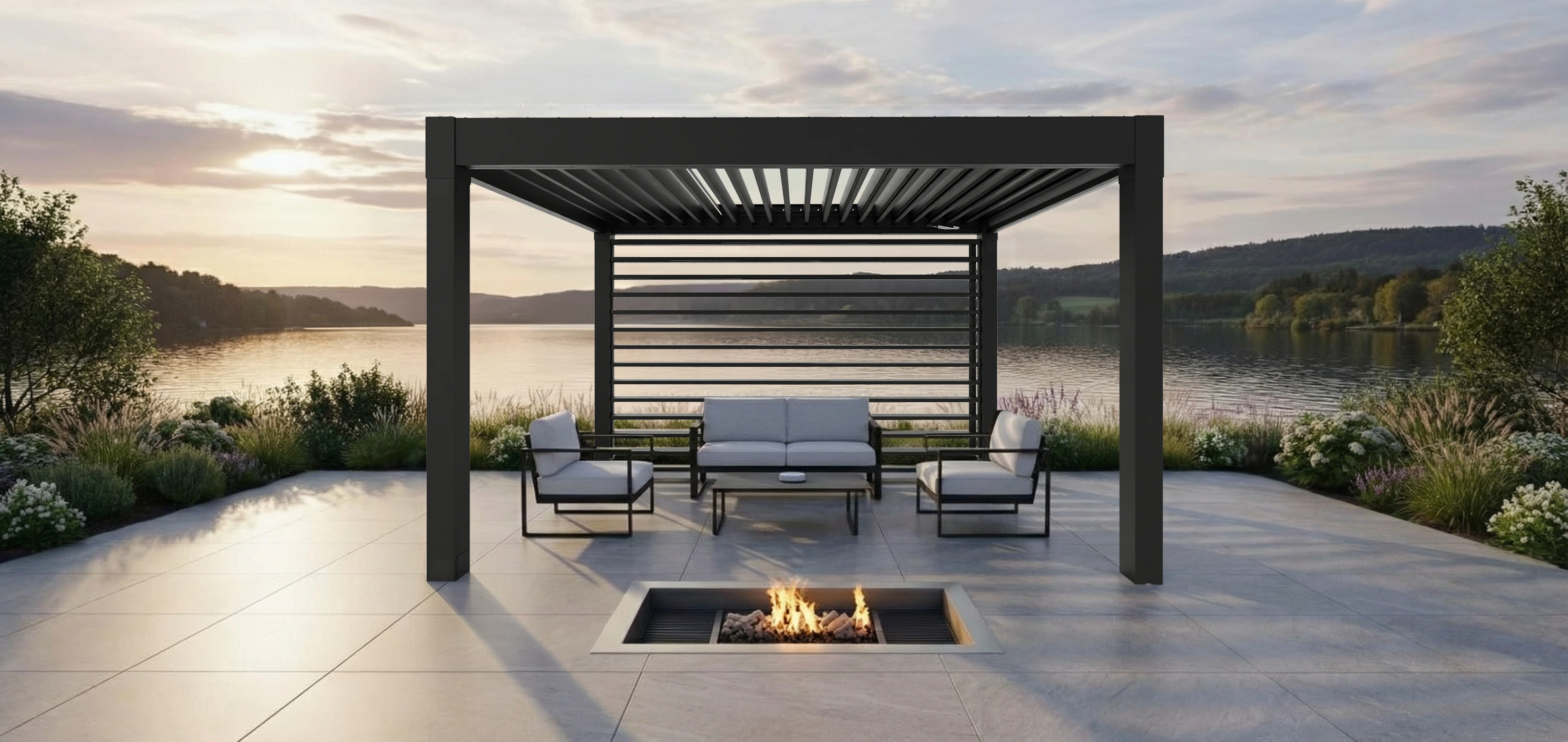 Motorized pergola installation with adjustable roof louvers and rear vertical louver wind wall overlooking a lake