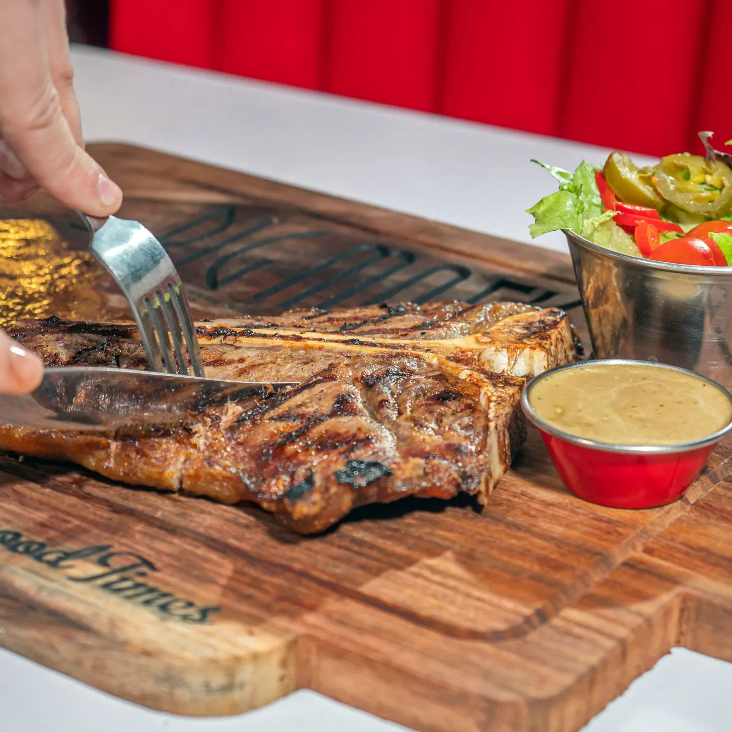 Savory perfection! A mouthwatering steak presented on a rustic wooden board.