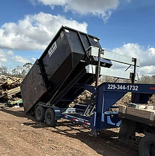 roll off dumpster dumping debris at landfill in moultrie georgia