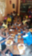 Girls Eating Jollof Rice