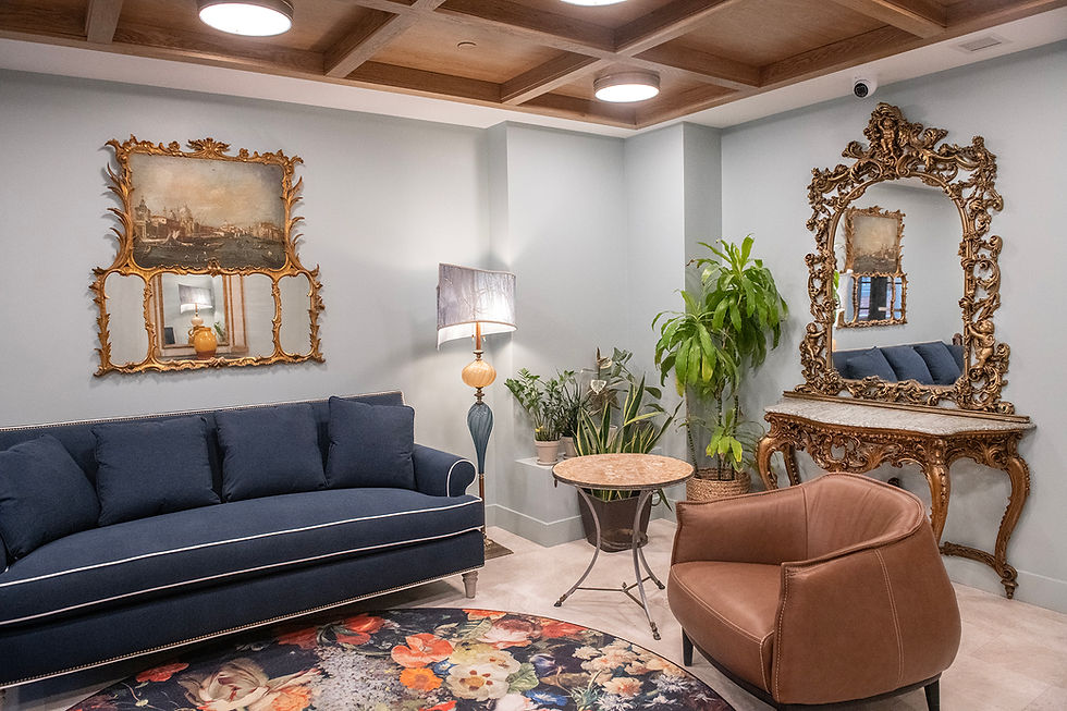 Close-up view of the Mews Apartment’s cozy living room with exposed brick walls and modern decor