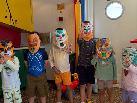 6 children wearing handmade masks