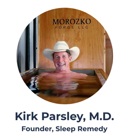 Dr Kirk Parlsey in cowboy hat, submerged in his Morozko ice bath up to his arm pits.