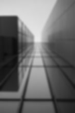 greyscale-roof-modern-building-with-glass-windows-sunlight.jpg