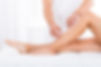 Close-up Of A Beautician Waxing Woman's