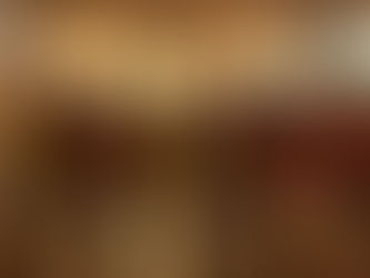 Cafenomad Team Sitting on the beach facing tables