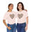Thumbnail: Flower Heart T-shirt on two friends giving a hug