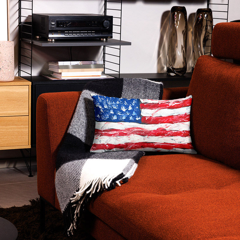 Thumbnail: American flag pillow lumber size shown on a living room couch
