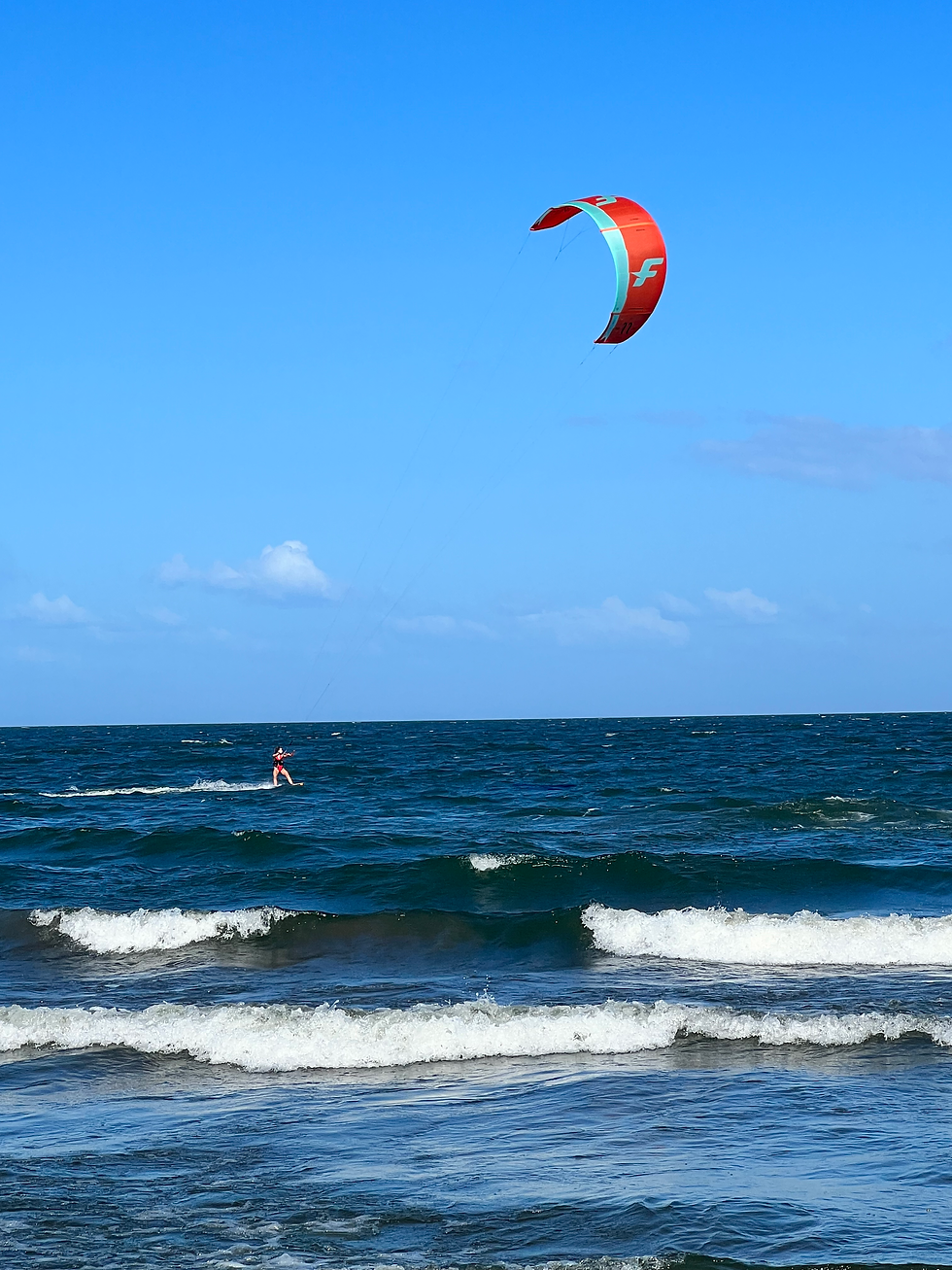 Girl riding with F-ONE kite in Ometepe