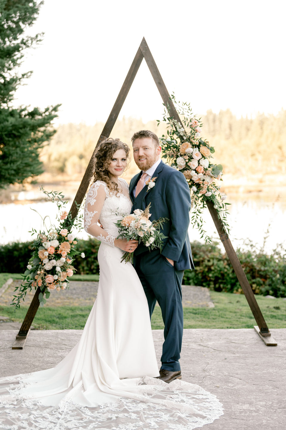 Danny and Tiffany from Tiffany Stumpf Photography posing during their own wedding