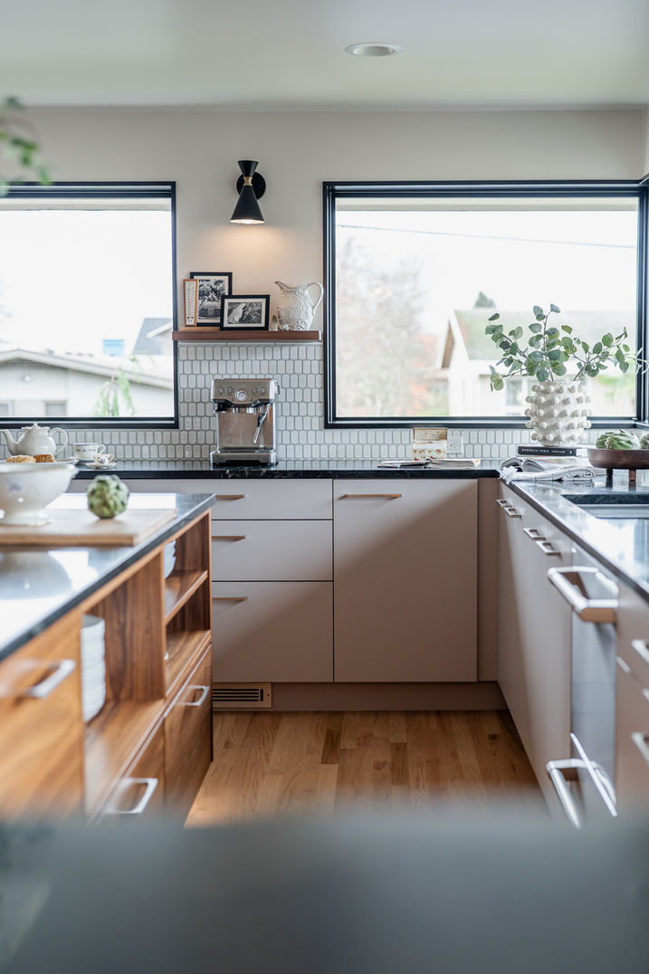 Kitchen with wooden cabinetry and stainless steel appliances in Puget Sound home