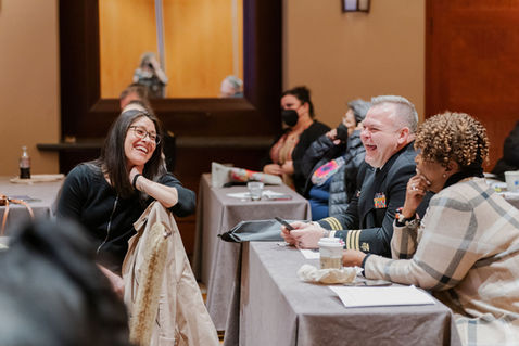 Group smiling and engaging during Seattle session