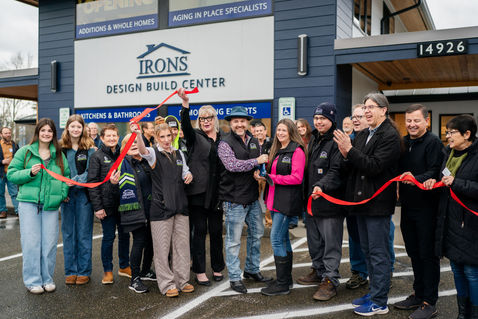 Large group ribbon-cutting at IRONS Design Build Center