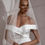 Thumbnail: Bride in white dress and veil, Alena Leena, Jade, looking away from the camera.