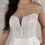 Thumbnail: Woman wearing white strapless wedding dress, smiling, Bow Two Tier Veil, andsheloves