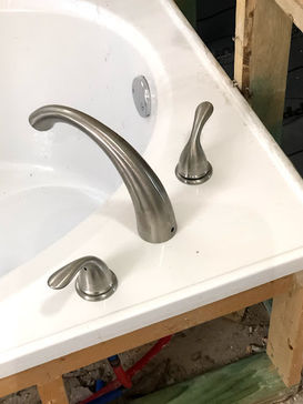 Experience the flawless plumbing work of Jensen Plumbing LLC, as they skillfully install a standard sink in a new construction home in the Denton area.