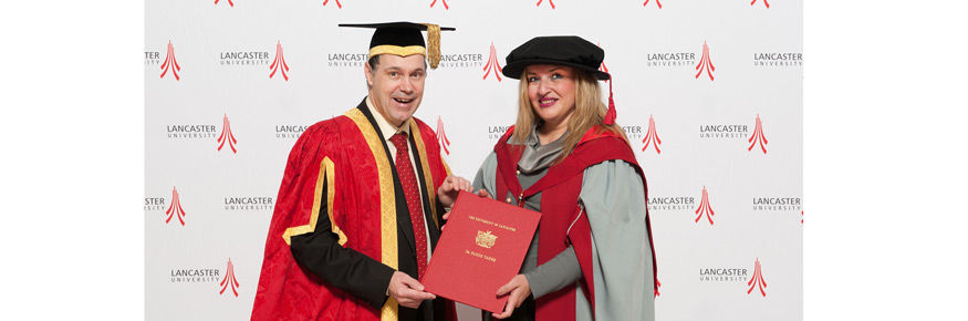Nahed Taher receiving Alumni Award from Lancaster University