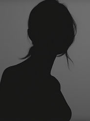 woman silohuette in grey tones without any face like a emoticone.jpg