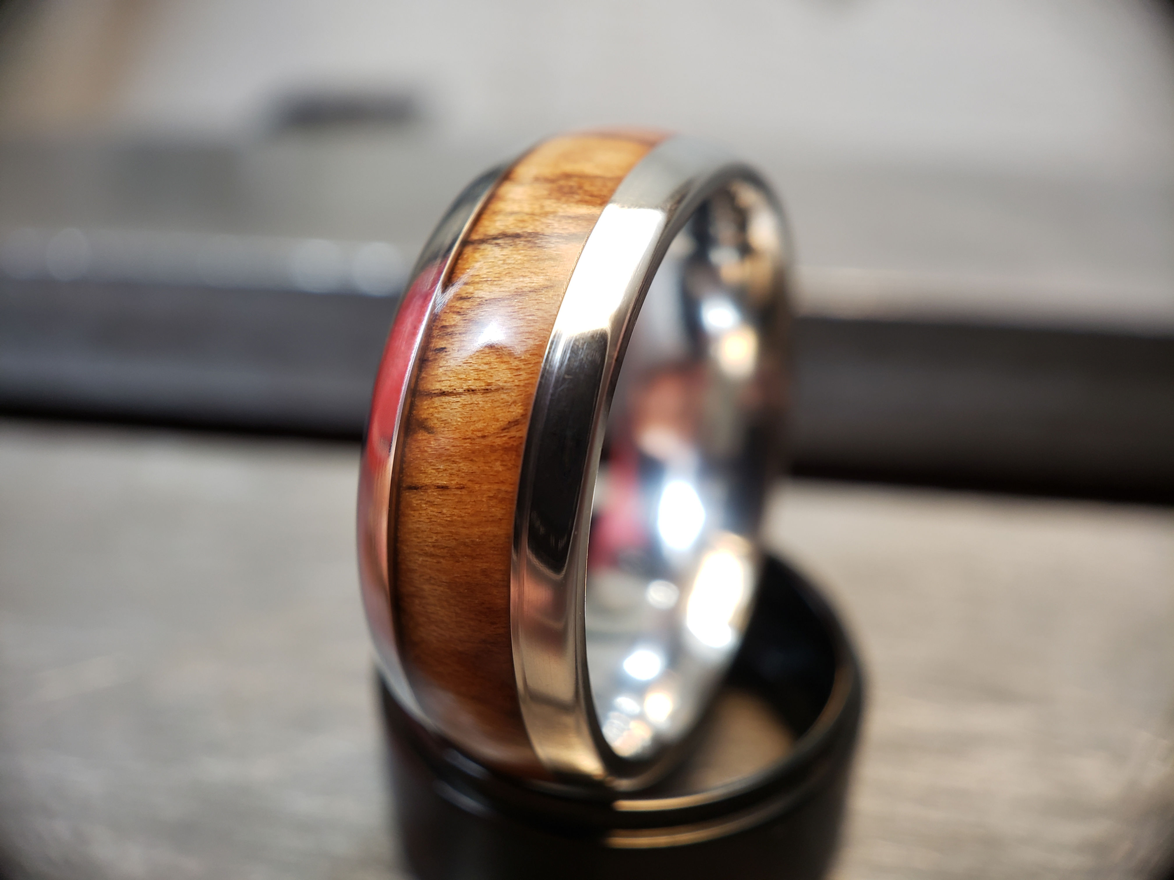 Metal ring with spalted Hawthorn wood inlay