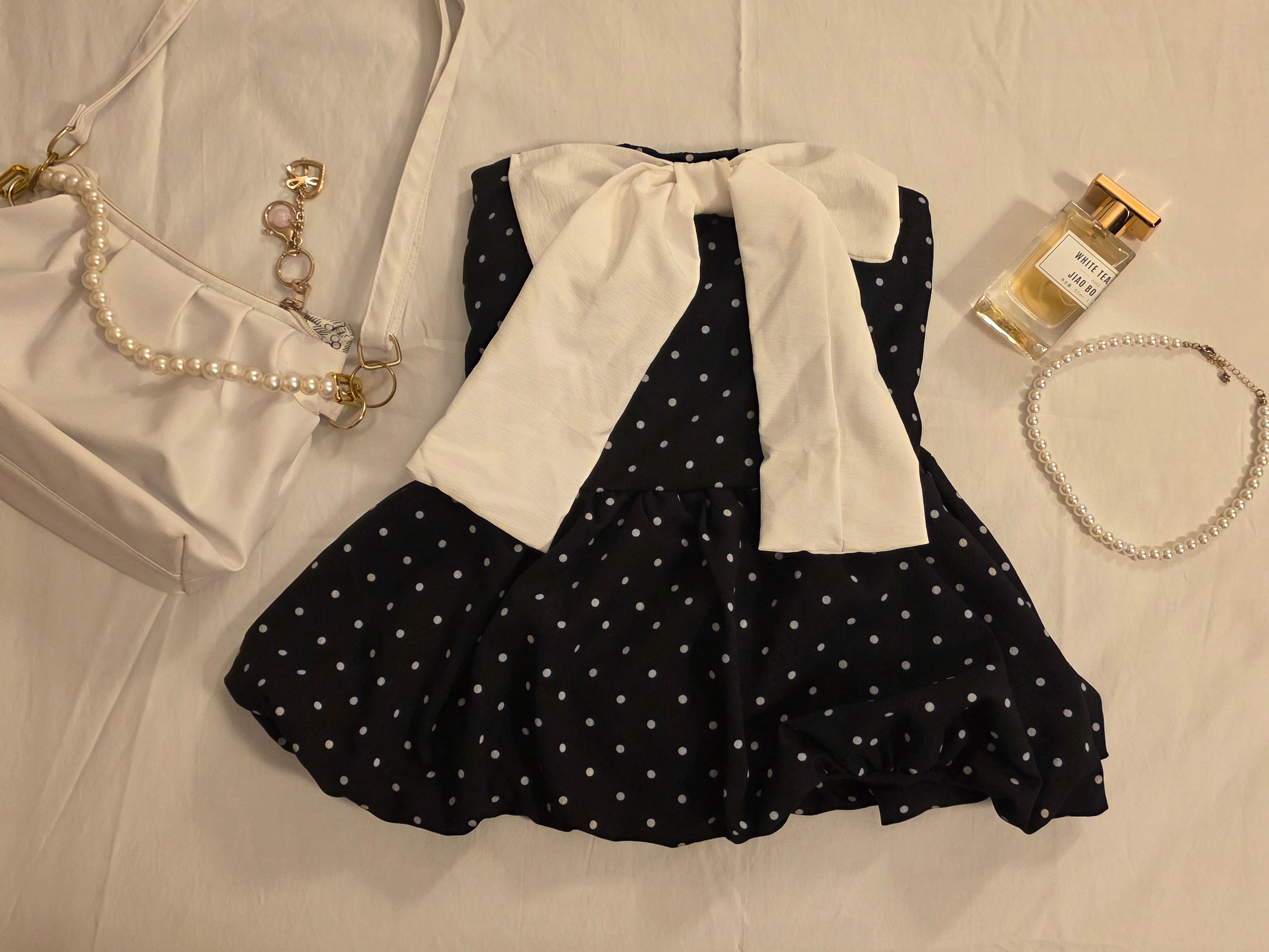 Sleeveless bow front top 