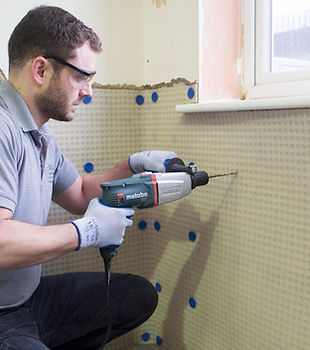Damp-proofing-walls-with-membrane.jpeg