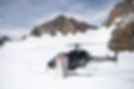 Wedding Elopement In Franz Josef Glacier New Zealand Newly Wed Couple Kissing In Front Of Helicopter In Snow On Top Of The Southern Alps
