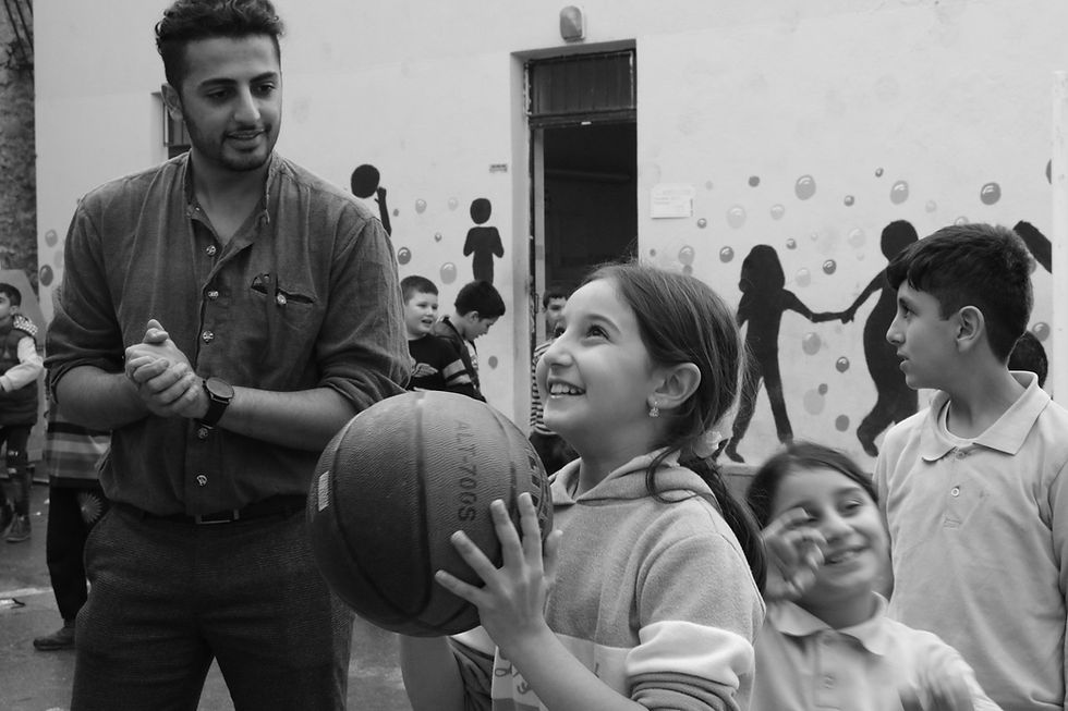 Children playing basketball