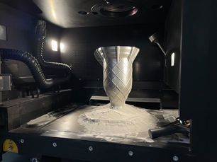 Ultrasonic excitation: A new tool in the industrial depowdering toolbox