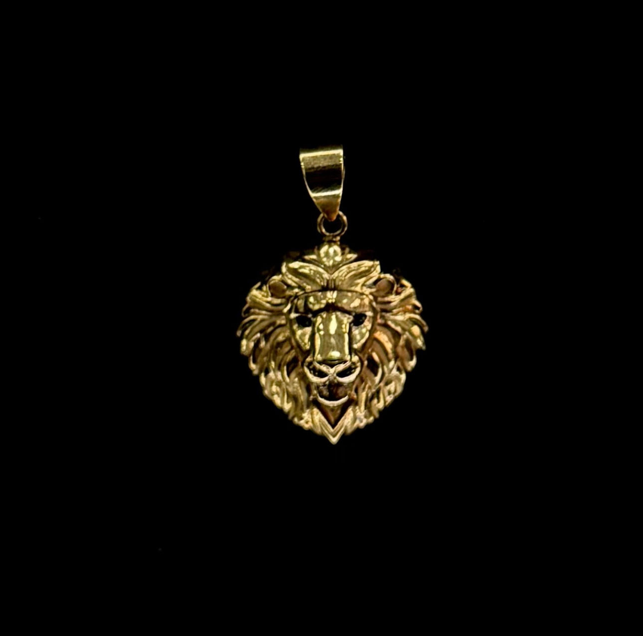 Dije de león de oro 10kts