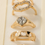 Thumbnail: Golden Heart Ring Stack