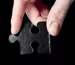 Missing-puzzle-part-in-hand-isolated-on.
