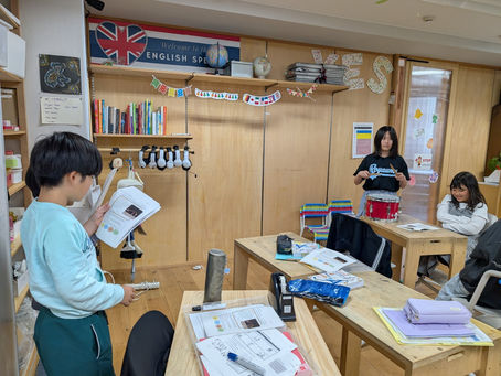 A YES International School student reading aloud during an English lesson in Yokohama.