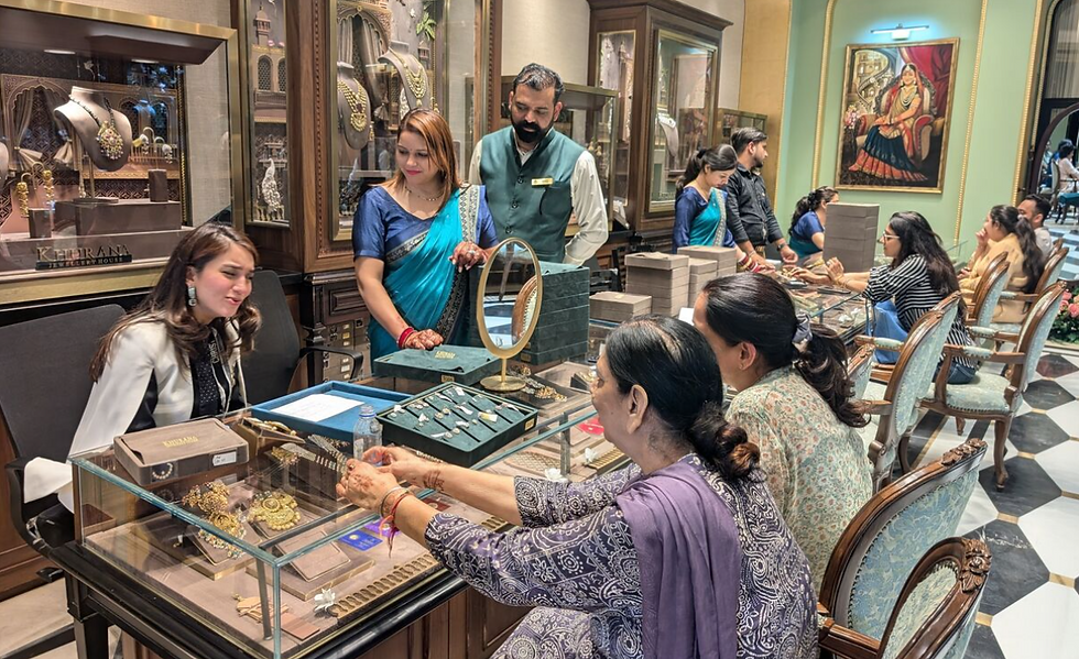 a beautifully workflow in a luxury jewellery showroom between owner, staffs and customer