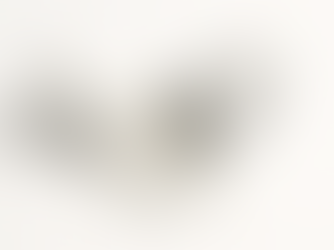 A pill opened in half with dust of social media logos