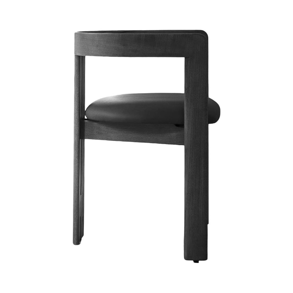 Modern black chair isolated on white background. Comfortable seating design.