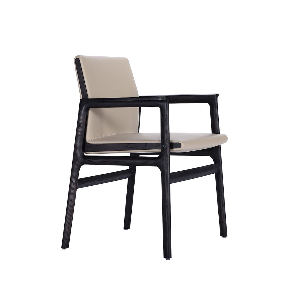Modern chair with black frame, beige seat and backrest. Nue Modern seating style.