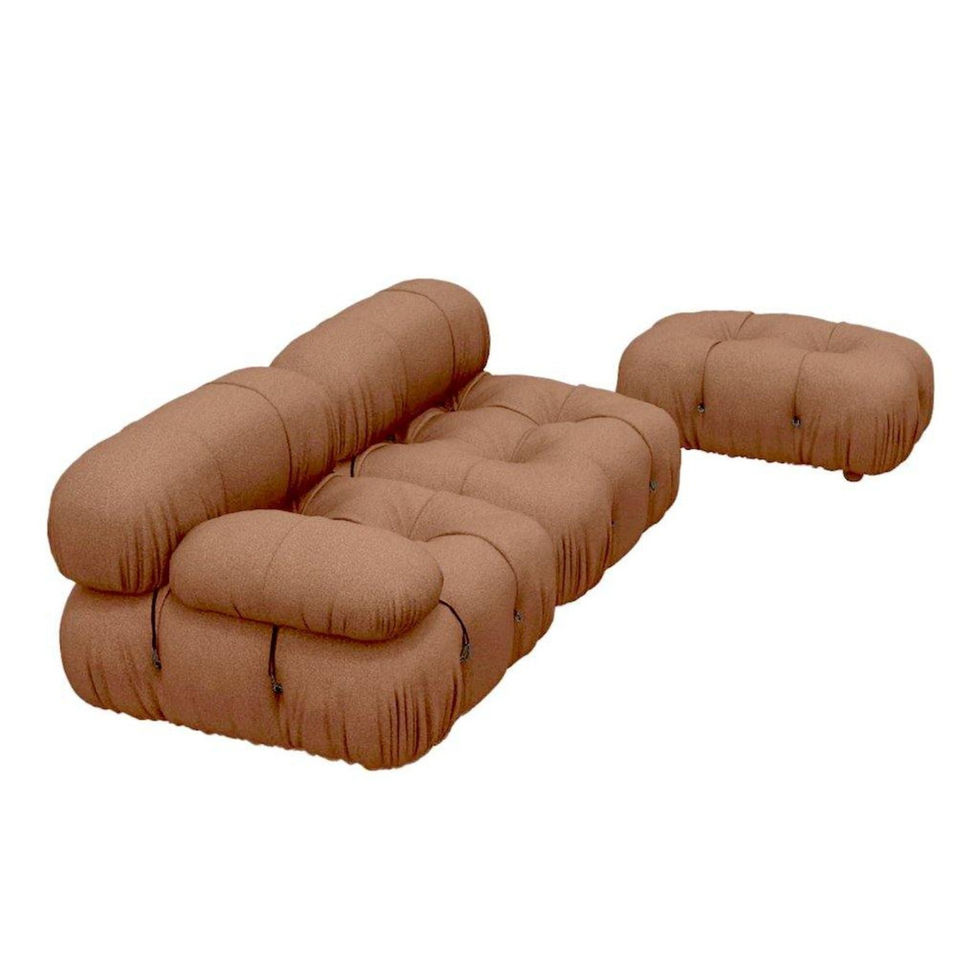 Brown modern sofa and ottoman, a stylish living room seating arrangement.
