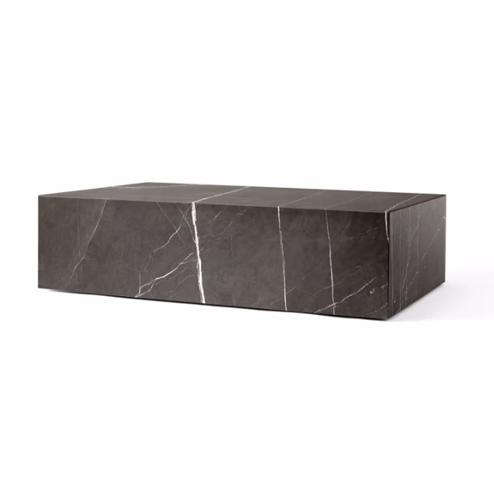 Dark brown marble coffee table, rectangular shape with white veining.