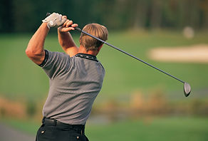 Golfer Swinging Club