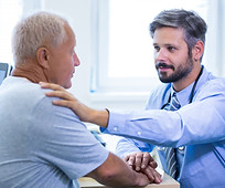 male-doctor-examining-patient.jpg