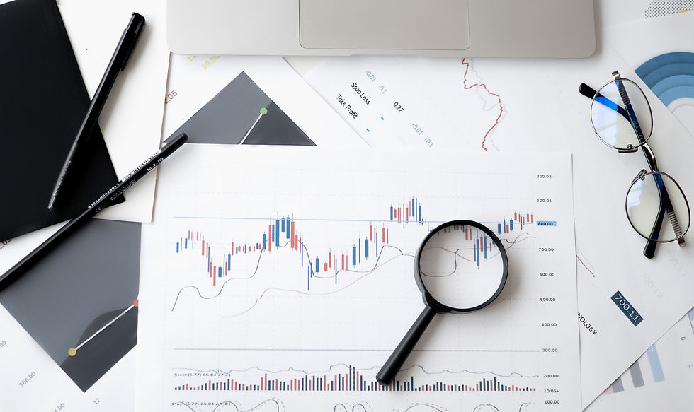 Investor analyzing stock market charts and financial data on multiple screens to build long-term wealth